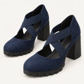 The Clara in Midnight Navy with textured uppers, elastic cross straps and black block heels